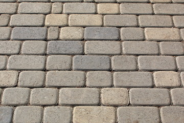 The pavement from yellow stone blocks
