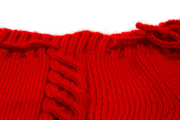 texture of red knitting fabric with a scythe