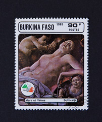 A stamp printed in the Burkina Faso, is devoted to the International Philatelic Exhibition Italia 85, shows a picture of Botticelli, "Venus and Mars", circa 1985 in Burkina Faso