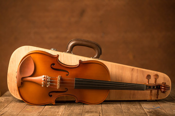Naklejka na ściany i meble Vintage violin and case with old steel background