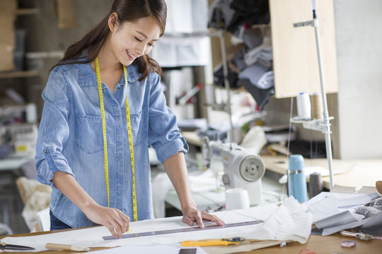 Fashion designer working in studio