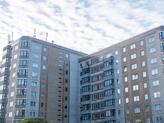 Residential Apartment Building with Bright Sky