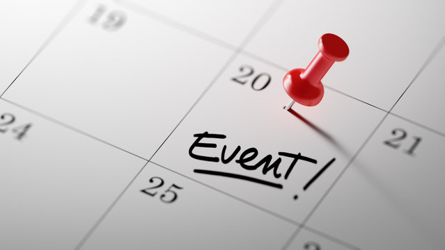 Concept image of a Calendar with a red push pin. Closeup shot of