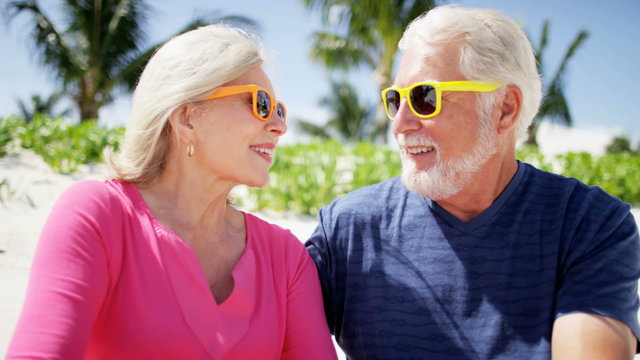 Caucasian senior couple enjoying a beach vacation