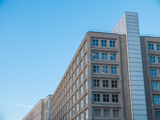 Fototapeta na wymiar Low Rise Building with Clear Blue Sky