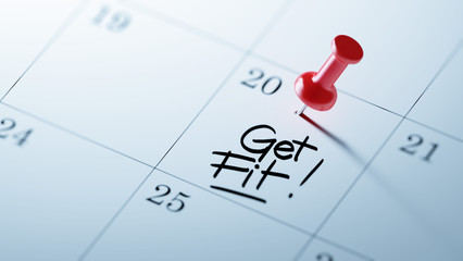 Concept image of a Calendar with a red push pin. Closeup shot of