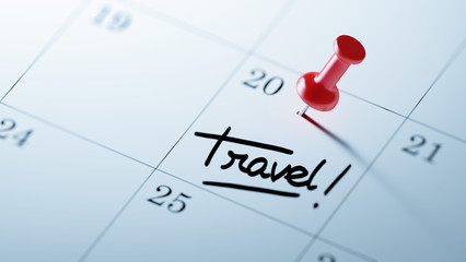 Concept image of a Calendar with a red push pin. Closeup shot of