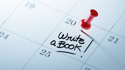 Concept image of a Calendar with a red push pin. Closeup shot of