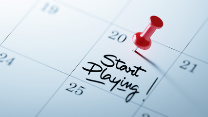 Concept image of a Calendar with a red push pin. Closeup shot of