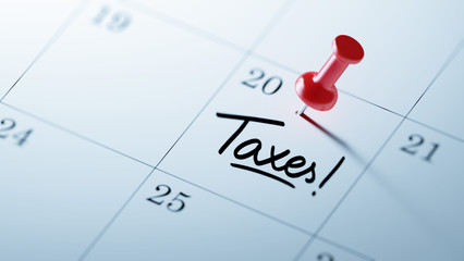 Concept image of a Calendar with a red push pin. Closeup shot of