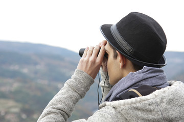 outdoor looking through binoculars