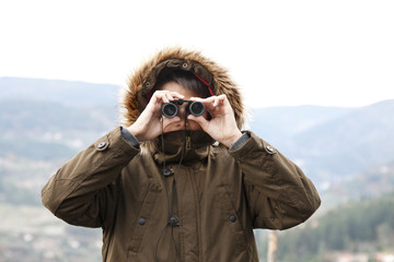 outdoor looking through binoculars