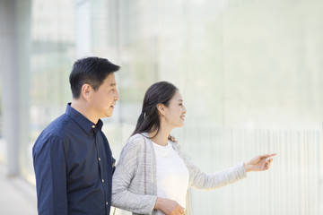Happy mature couple shopping