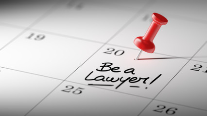 Concept image of a Calendar with a red push pin. Closeup shot of