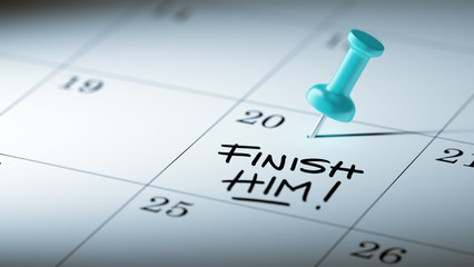 Fototapeta premium Concept image of a Calendar with a blue push pin. Closeup shot o