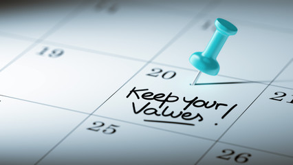 Fototapeta premium Concept image of a Calendar with a blue push pin. Closeup shot o