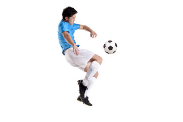 Fototapeta na wymiar Soccer player jumping