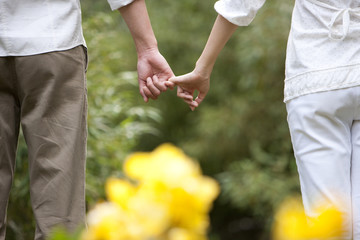 Young couple hand in hand