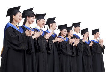 Portrait of graduates clapping hands