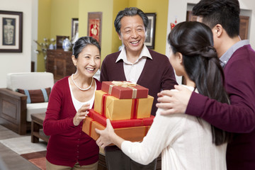 Family visiting with gifts during Chinese New Year