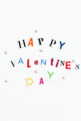 Fototapeta na wymiar Happy Valentines Day Letters cut out from the Magazines