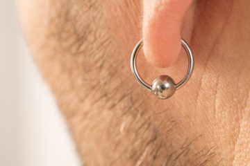 pierced ear of a  man