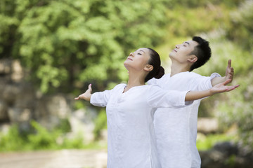 Young adult practicing yoga