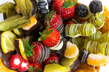 Variety of fresh fruits with decorative chocolate