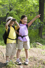 Fototapeta premium Brother and sister bird watching