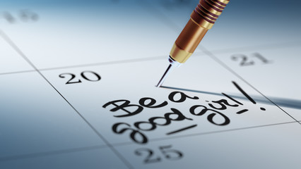 Concept image of a Calendar with a golden dart stick.. The words