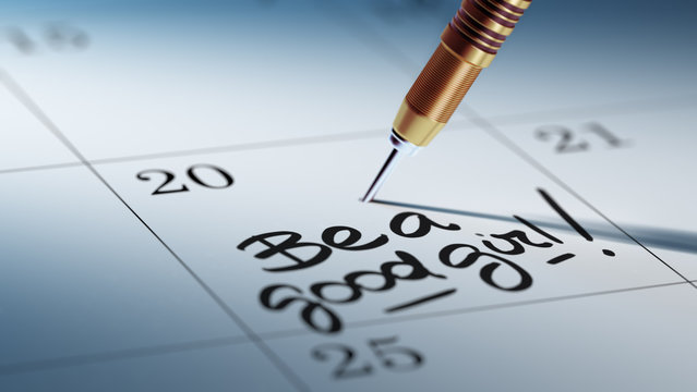 Concept image of a Calendar with a golden dart stick.. The words