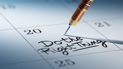 Concept image of a Calendar with a golden dart stick.. The words