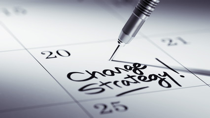 Obraz premium Concept image of a Calendar with a golden dart stick.. The words