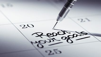 Obraz premium Concept image of a Calendar with a golden dart stick.. The words