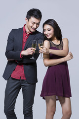 Happy young couple at a party