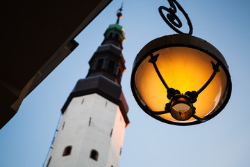 Round street lamp and church of old Tallinn