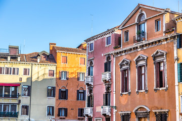 Fototapeta na wymiar Venice landmark, colorful houses and boats, Italy.