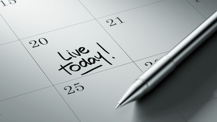 Closeup of a personal agenda setting an important date written w