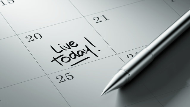 Closeup of a personal agenda setting an important date written w