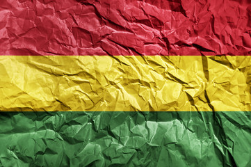 Bolivia flag painted on crumpled paper background