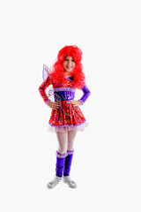 young girl in colorful as winx carnival costume, red periwig peruke.