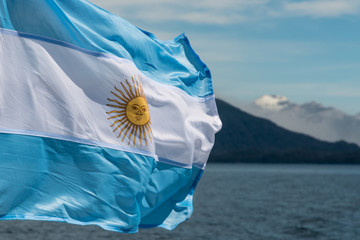 Fototapeta premium Argentina flag with mountains in background