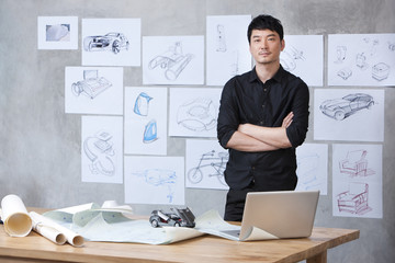 Portrait of car designer in studio