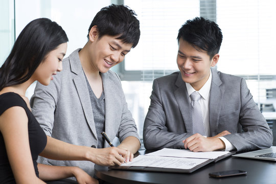 Young couple with financial consultant