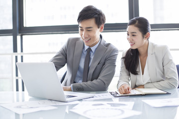 Fototapeta premium Young business person talking in meeting