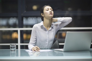 Young businesswoman working in office