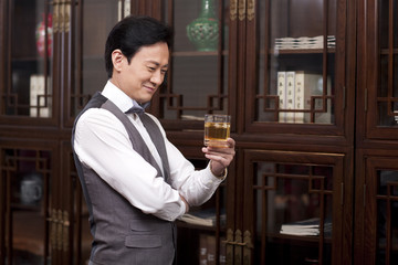 Wealthy businessman with wine