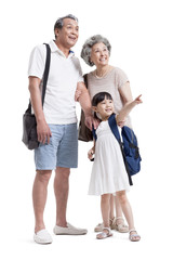 Fototapeta premium Joyful grandparents and granddaughter looking at view