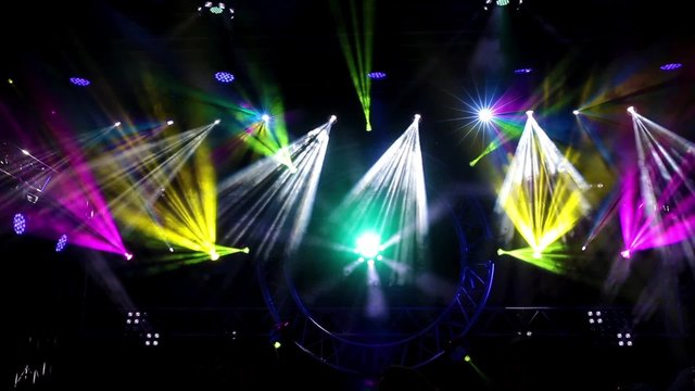 Rock concert and disco party stage colorful lights 