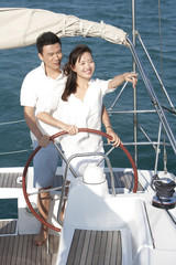 Young couple sailing